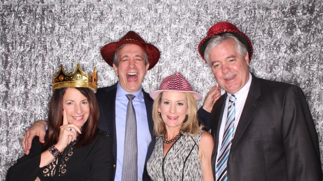 Guests having fun in photobooth at birthday party