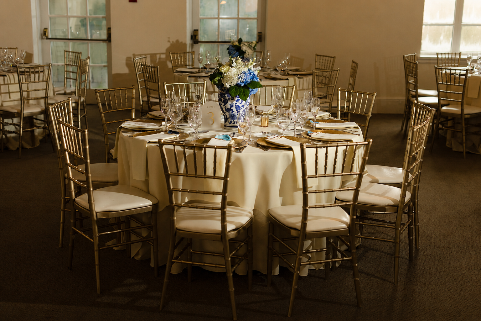 Wedding reception dinner tables inside Epping Forest Yacht Club Jacksonville FL — Footloose Entertainment DJ and entertainment