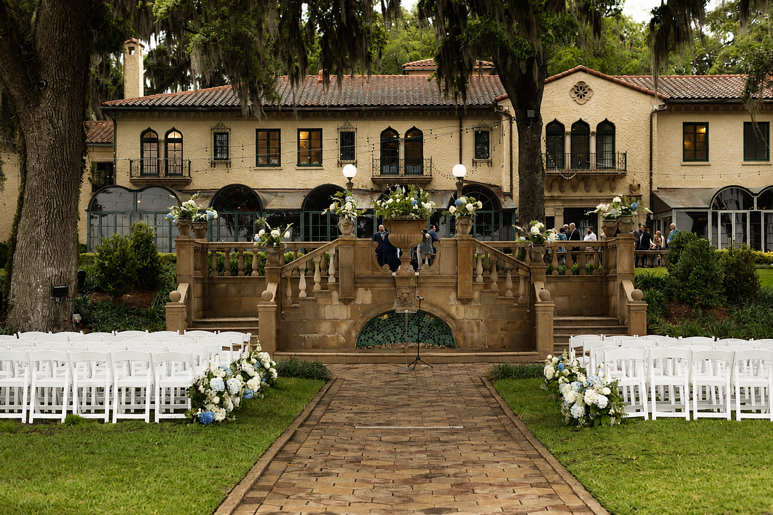 Outdoor wedding ceremony setup in the English Gardens at Epping Forest Yacht Club Jacksonville FL — Footloose Entertainment
