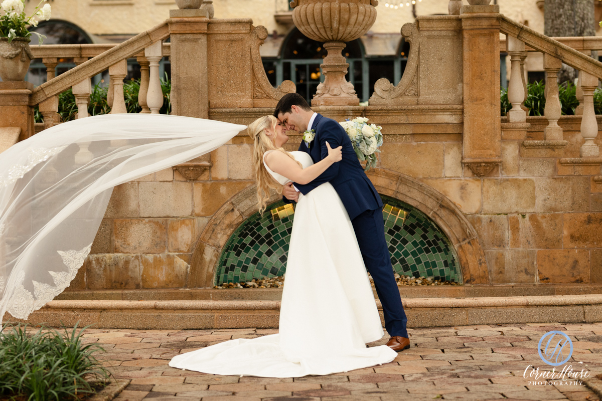 Bride and groom embracing at the fountain at Epping Forest Yacht Club Jacksonville FL — Footloose Entertainment wedding DJ