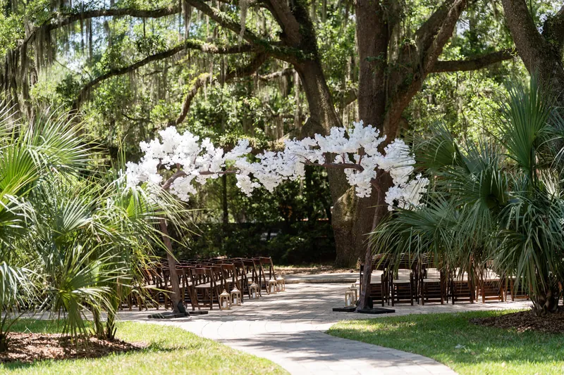 Outdoor wedding ceremony setup under live oak canopy at Bowing Oaks, Jacksonville FL