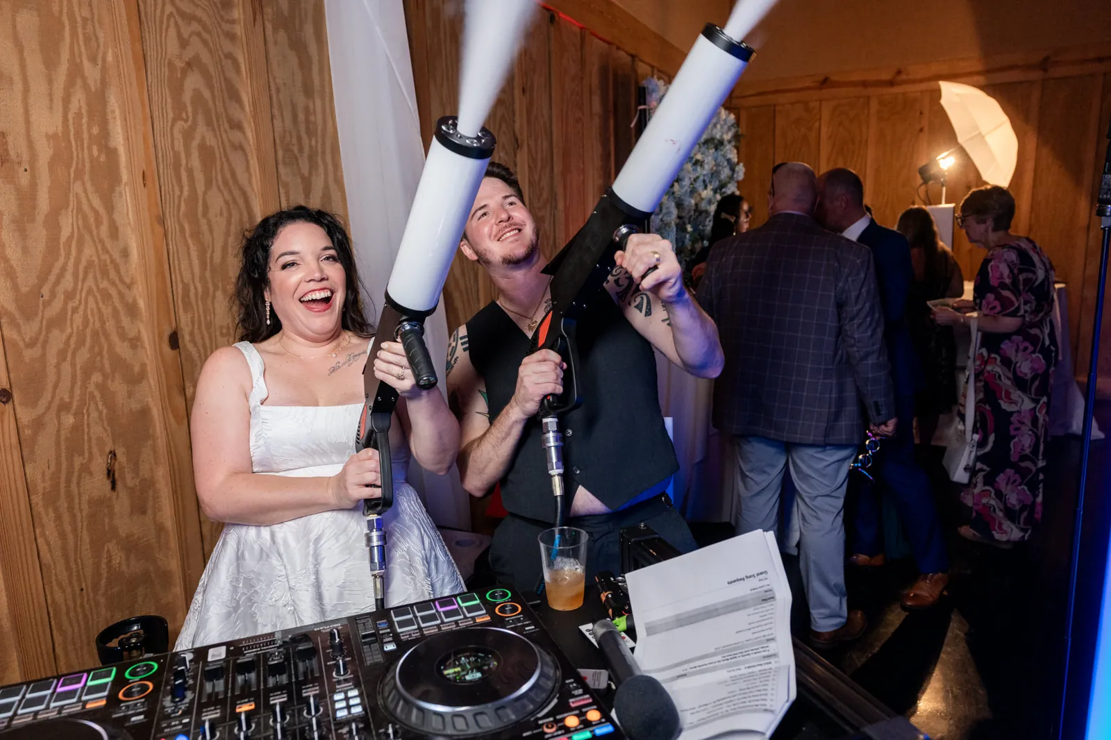 Bride with Footloose Entertainment DJ using CO2 cannons at Bowing Oaks reception, Jacksonville FL