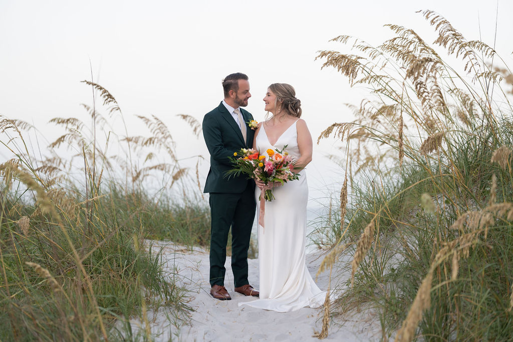 Wedding couple portrait in the beach dunes near Casa Marina Hotel, Jacksonville Beach FL