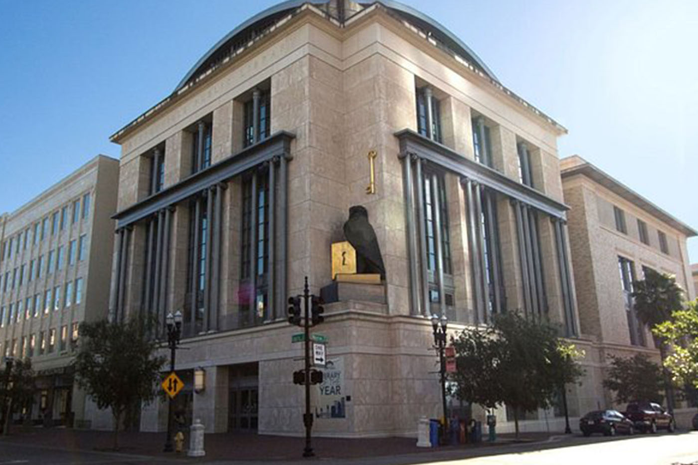 Jacksonville Main Library exterior in downtown Jacksonville FL, limestone civic building with owl sculpture and key artwork, conference center wedding venue