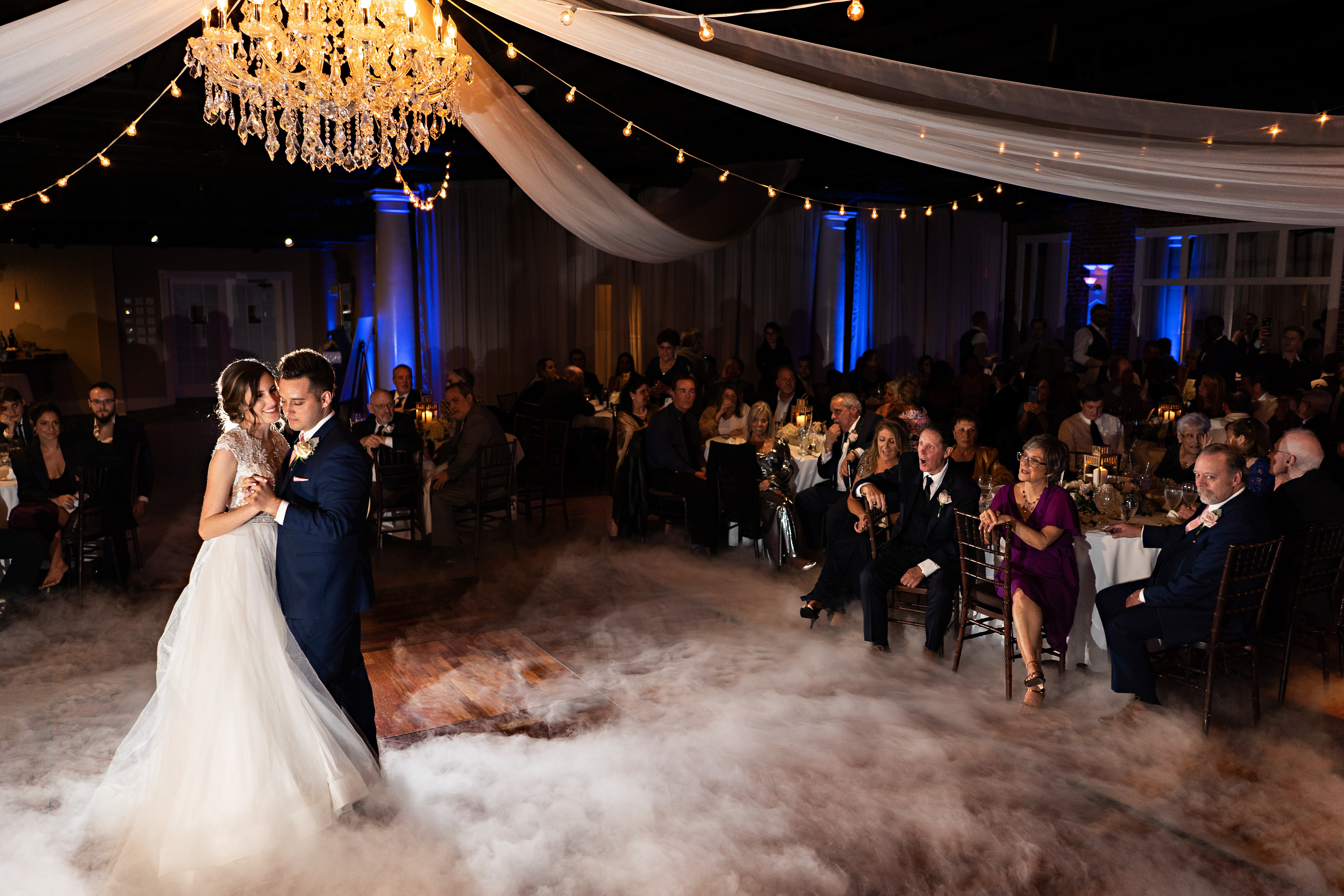 First dance with dry ice fog and blue uplighting at The White Room St Augustine FL — Footloose Entertainment wedding DJ and special effects