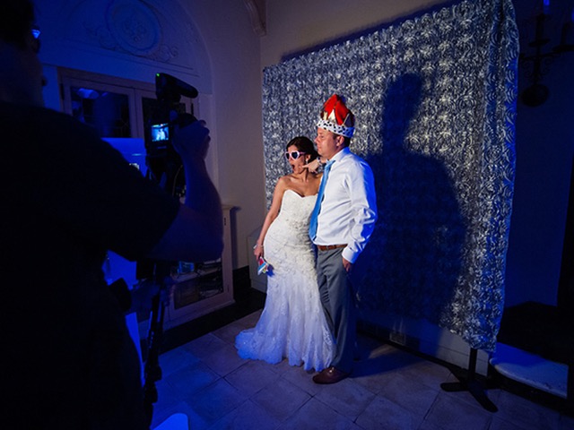 Wedding photobooth with custom backdrop and props